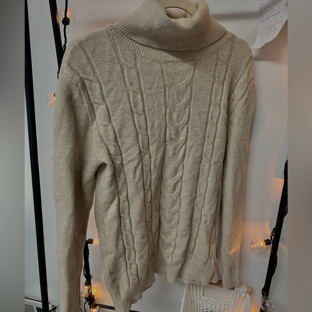 Women’s beige turtleneck knitted sweater